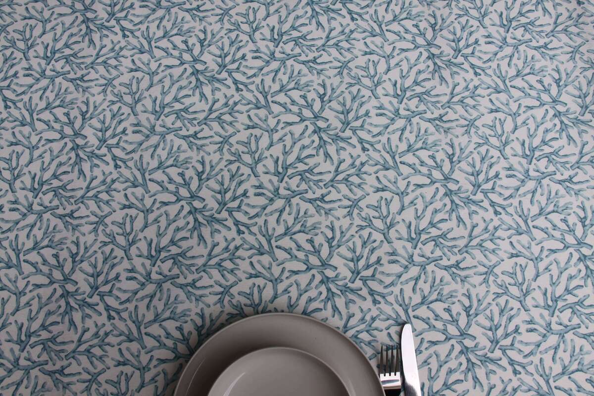 Mantel resinado antimanchas coral turquesa.