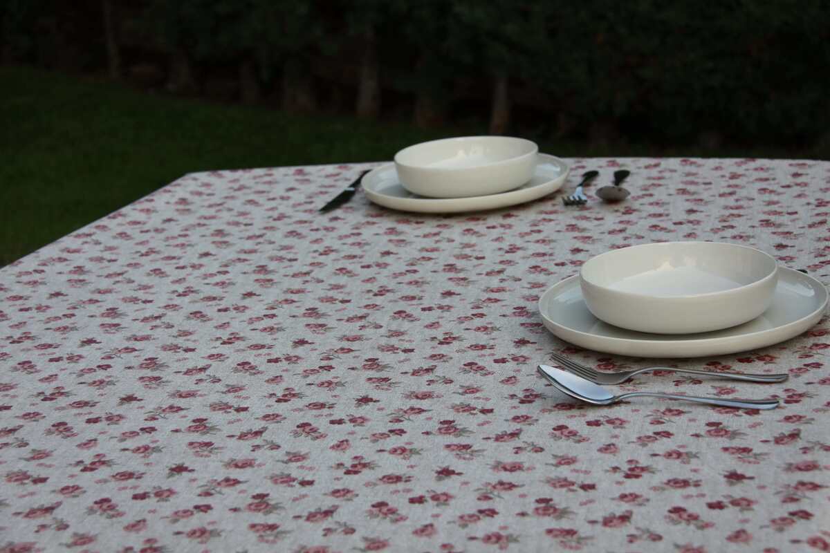 Mantel anti manchas mini flor rosa